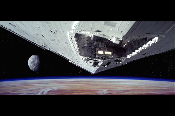 An Imperial Star Destroyer pursues Princess Leia's ship in the famous opening shot of STAR WARS: A NEW HOPE from 1977. Photo: Film Frame..© Lucasfilm