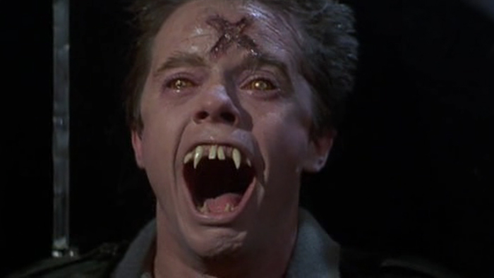 Stephen Geoffreys having a bad day as Evil Ed in Tom Holland's clever twist on vampire films, FRIGHT NIGHT -- the original and still the best!