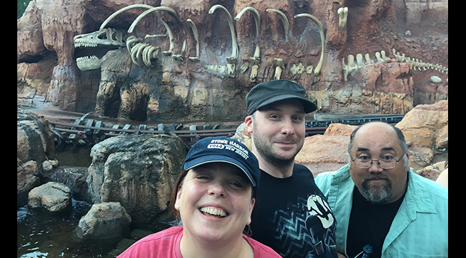 Disneyland is getting to Jack who breaks out a smile with Trish and Frank Woodward at Big Thunder Mountain in Disneyland.