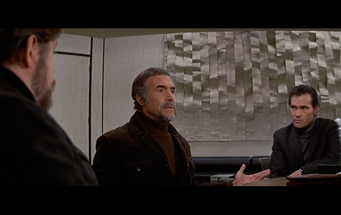 An interrogation scene from CONQUEST OF THE PLANET OF THE APES, (L to R): Severn Darden, Ricardo Montalban and H.M. Wynant.